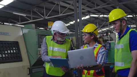 Blue-collar Worker. multi-ethnic team of technician and engineer are checking Stock Footage 196437583