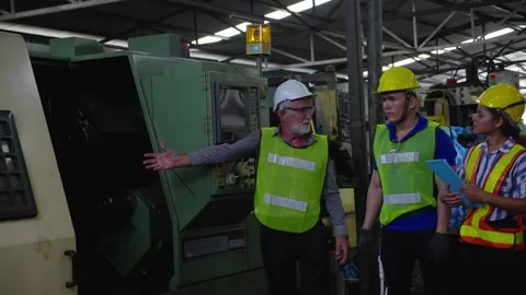 Blue-collar Worker. multi-ethnic team of technician and engineer are checking 스톡 동영상 196437592