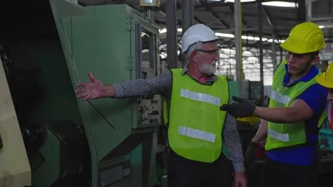 Blue-collar Worker. multi-ethnic team of technician and engineer are checking Видео 196437615