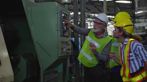 Blue-collar Worker. multi-ethnic team of technician and engineer are checking Stock Footage 196437642