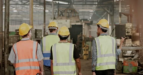Blue-collar Worker. multi-ethnic team of technician and engineer are checking Video stock 201873962