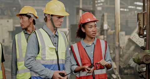 Blue-collar Worker. multi-ethnic team of technician and engineer are checking Видео 201874244