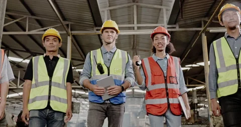 Blue-collar Worker. multi-ethnic team of technician and engineer are checking Video stock 201875763