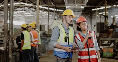 Blue-collar Worker. multi-ethnic team of technician and engineer are checking Stock Footage 201875913