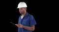 Blue collar worker - uses screw driver to do work HD Footage