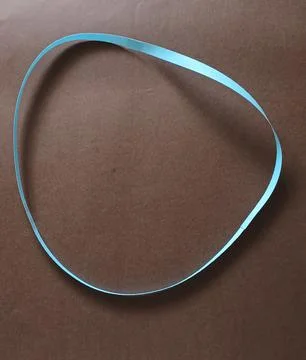 Blue color different shape mobius strip or band isolated on brown background 스톡 사진