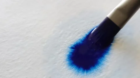 Blue color inks spreading out over wet paper background Stock Footage 277960797