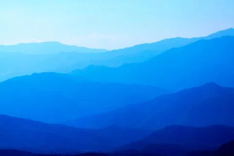 Blue color of mountains layer during sunset Stock-Fotos