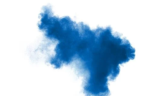 Blue color powder explosion cloud on white background.Closeup of Blue dust .. Stock Photos