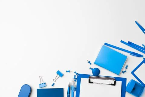 Blue color stationery set as pattern with copy space on white background, flat Foto stock