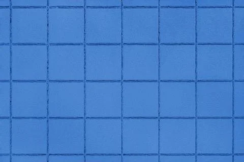Blue colored ceramic tile texture, background with square geometric pattern.. Stock Photos