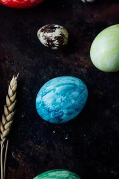 Blue colored easter egg similar to planet Earth Stock Photos