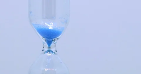 Blue Colored Hourglass extremely closeup 스톡 동영상 117407768