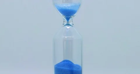 Blue Colored Hourglass extremely closeup 스톡 동영상 117407973