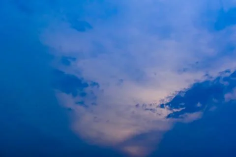 Blue colour in dramatic twilight sky and cloud sunset background. Stock Photos