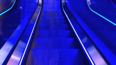 The blue coloured escalator is moving down. Stock Footage 104576550