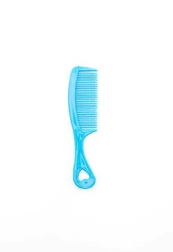 Blue comb on white Stock Photos