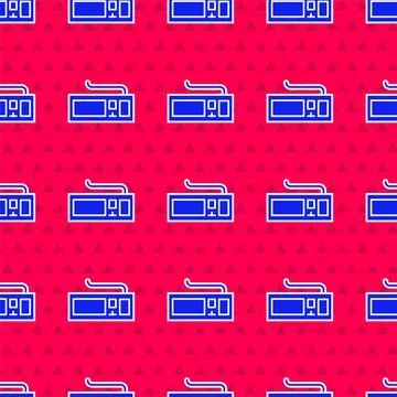 Blue Computer keyboard icon isolated seamless pattern on red background. PC Stock Illustration