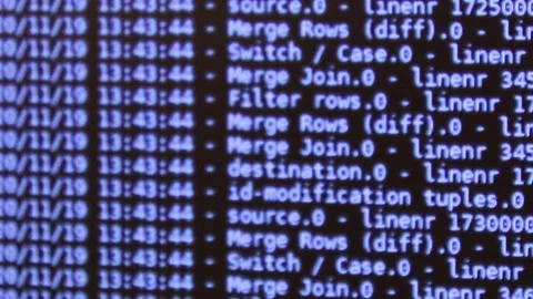 Blue computer software code moving on a black monitor reflect on glass defocu Stock Footage 144046903