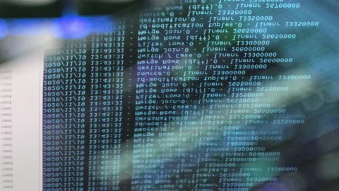 Blue computer software code moving on a black monitor reflect on glass. Abstr 스톡 동영상 144047301