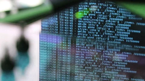 Blue computer software code moving on a black monitor reflect on glass. Abstr 스톡 동영상 144047993