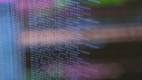 Blue computer software code moving on a black monitor reflect on glass. Abstr 스톡 동영상 144048591