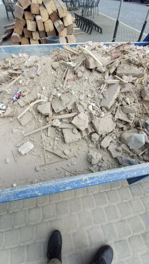 Blue Construction Waste Container Filled with Brick Rubble Vídeo Stock 333644019