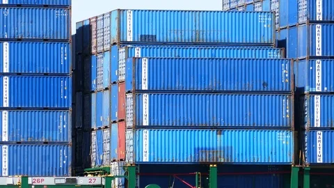 Blue containers freight ship sails 4k intro video for business Stock Footage 94554583