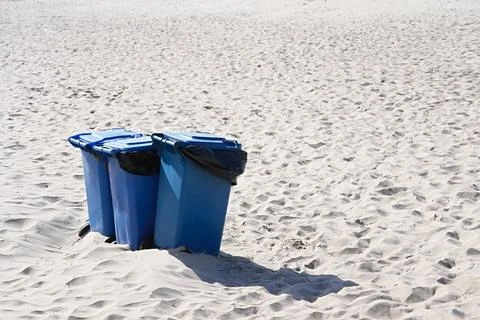 Blue containers for separate garbage collection, used to recycle waste on t.. Stock Photos