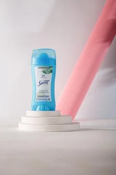 Blue cosmetics container on white background. Secret ph balanced deodorant Stock Photos