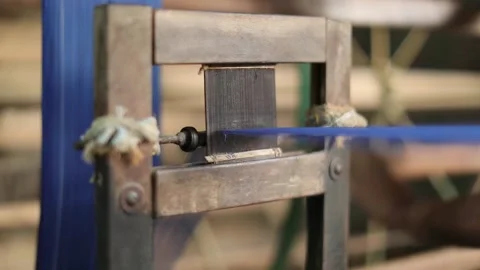 Blue cotton threads weaving in cotton textile mills , cloths manufacturing Stock Footage 131346301