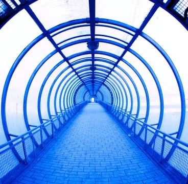 Blue covered bridge Stock Photos
