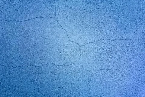 Blue cracked texture surface background. Copy space or backdrop for design p 스톡 사진