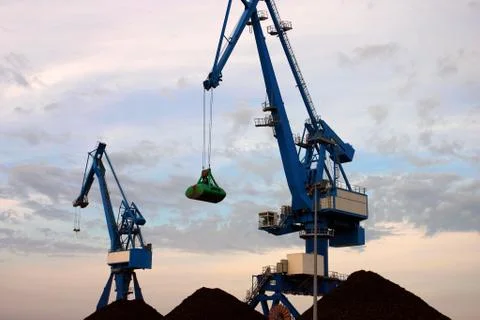 Blue cranes on the port Stock Photos