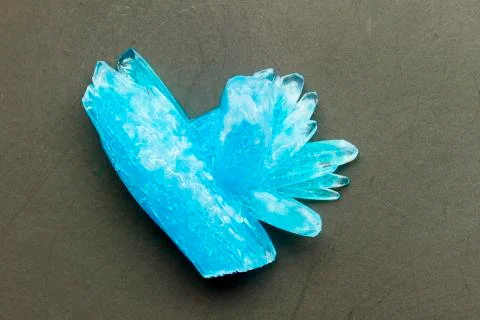 Blue crystal on black Stock Photos