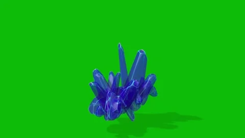 A blue crystal formation on a green background Vídeos de archivo 331103140
