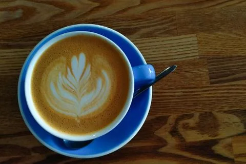 A blue cup of coffee Stock Photos