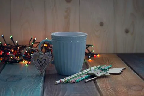 A blue cup of coffee on the table Stock Photos