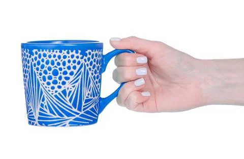 Blue cup mug in hand Stock Photos