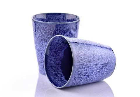 Blue cup on a white background Stock Photos