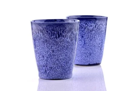 Blue cup on a white background Stock Photos