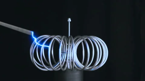 Blue current line closeup on coil sparkles like a rumble of thunder randomly 4K Video stock 113297388