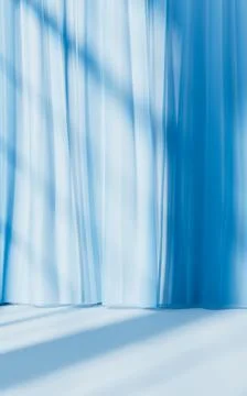 Blue curtain with sunlight comes in, 3d rendering. Ilustración de archivo