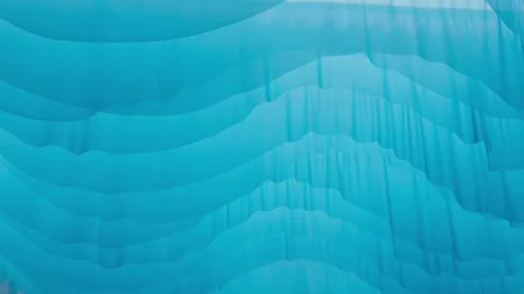 Blue curtains create an abstract art effect. Art background resembling waves. Stock Footage 328146059