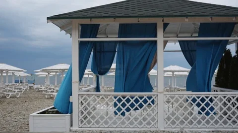 Blue curtains fluttering in the wind. Stock Footage 78487188