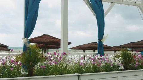 Blue curtains fluttering in the wind. Video stock 78494528