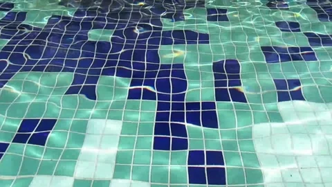 Blue -dark blue pool surface moving slowly Video stock 137262950