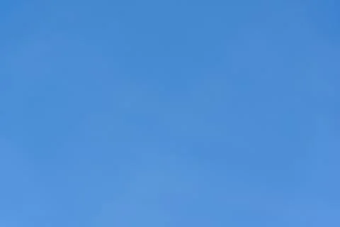 Blue day sky without clouds, calm scene Stock Photos