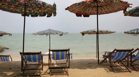 Blue deck chairs on beach Vídeos de archivo 49134919