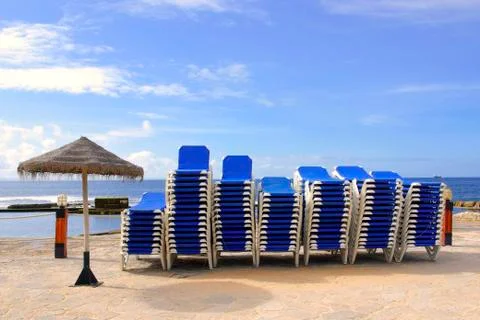 Blue deckchairs Stock Photos